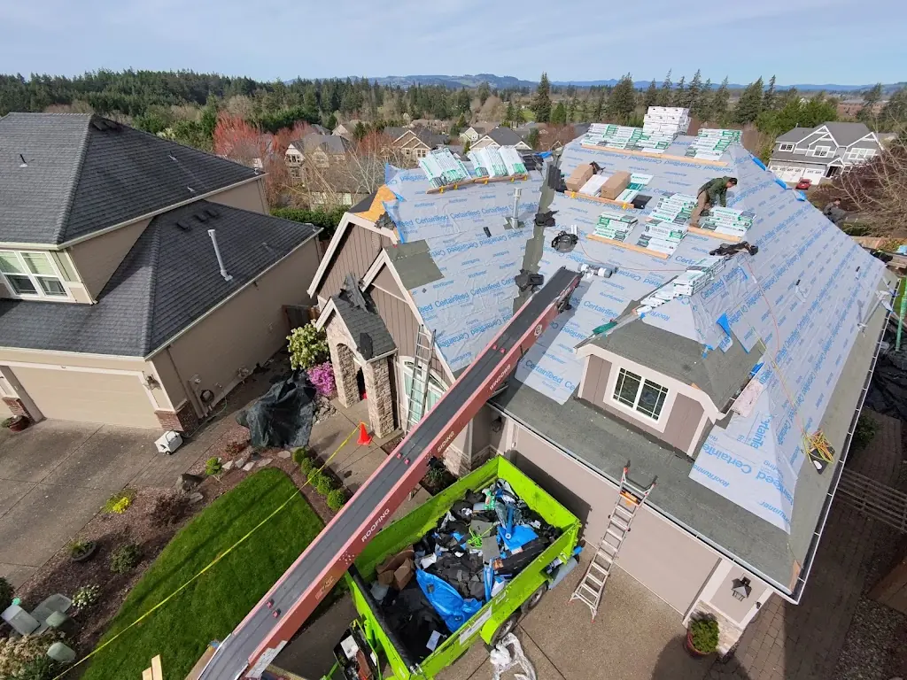 Remarkable Roofing crew installing a residential roof